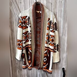 Vintage 1970s Sabra Wintuk cardigan, likely made of acrylic fiber, featuring a S